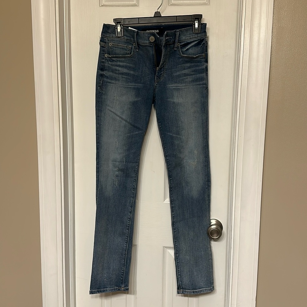 W express jeans. Stretch +. Skinny mid rise. Size 4R. Denim perfect. Never worn